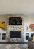 New fireplace with built-ins either side