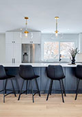 Use of accented cabinetry on the island