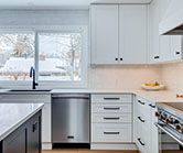 Wide frame shaker style cabinets in off white