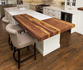 Island has solid walnut and quartz countertops