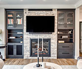 A mix of practical storage, bookshelves and glass display space