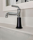 Vanity faucet in black and chrome finish