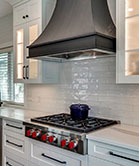 A stunning custom kitchen range hood