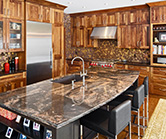 Shaker style doors in natural walnut, cabinets to 9' ceiling